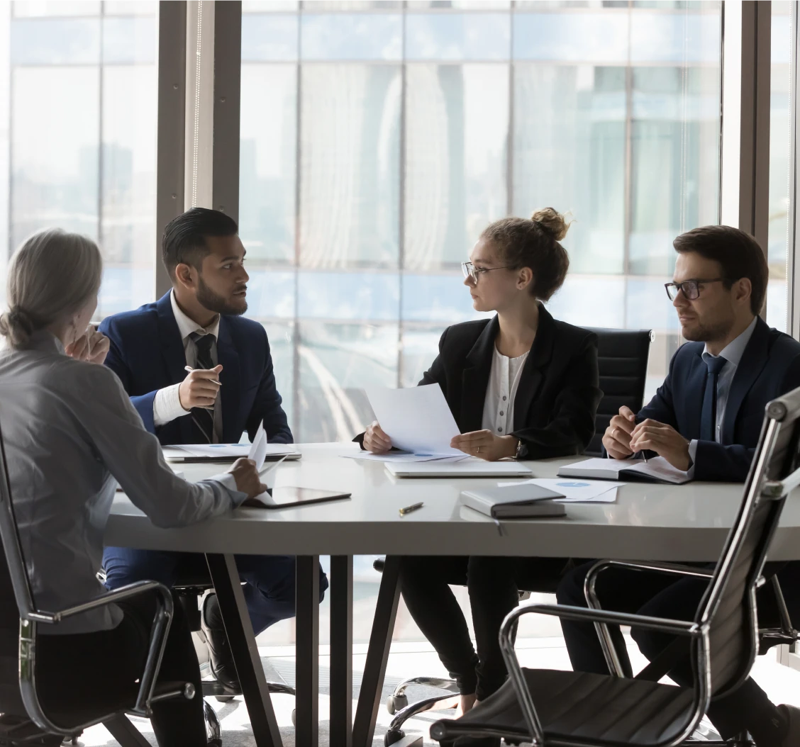 Corporate meeting with four people